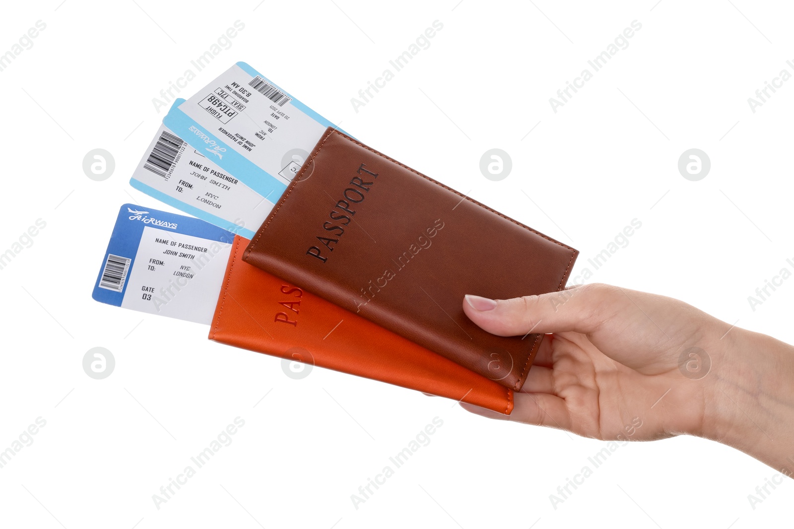 Photo of Travel agency. Woman holding flight tickets and passports on white background, closeup