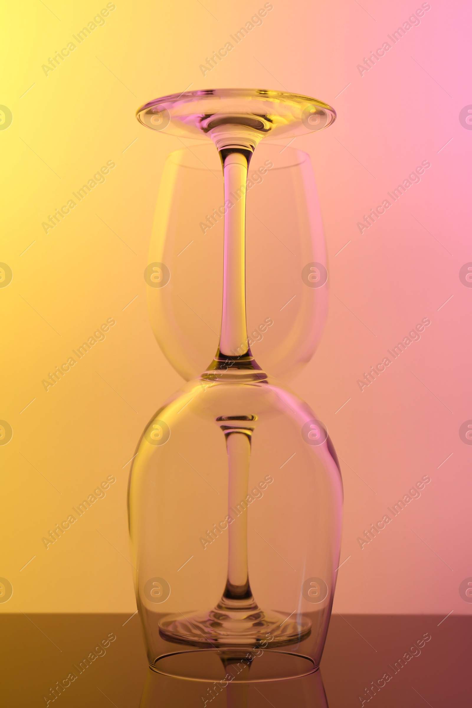 Photo of Empty glasses on table, color tone effect