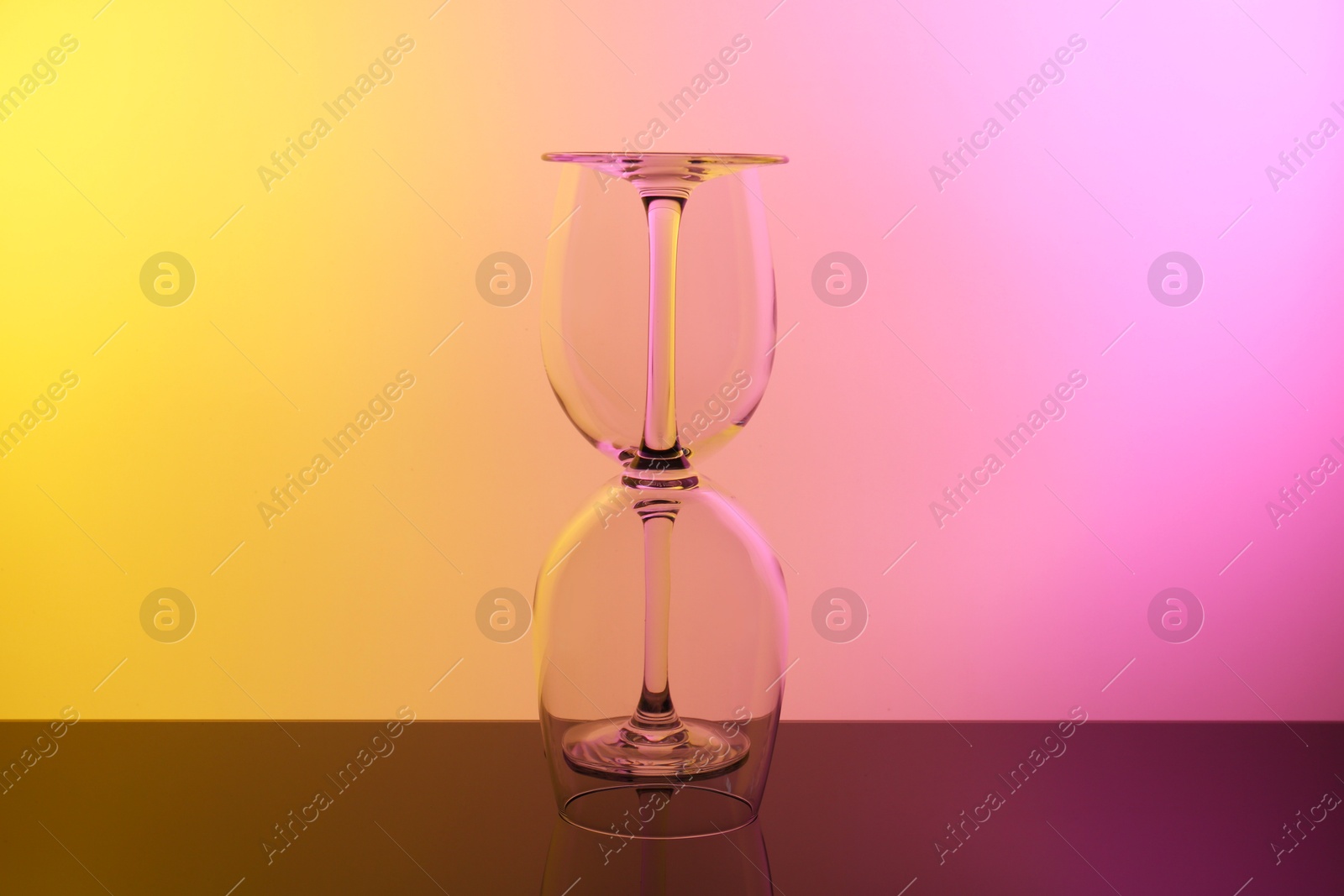 Photo of Empty glasses on table, color tone effect