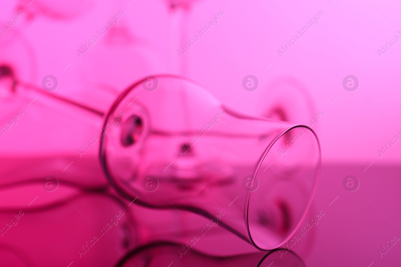 Photo of Empty glasses on table, color tone effect