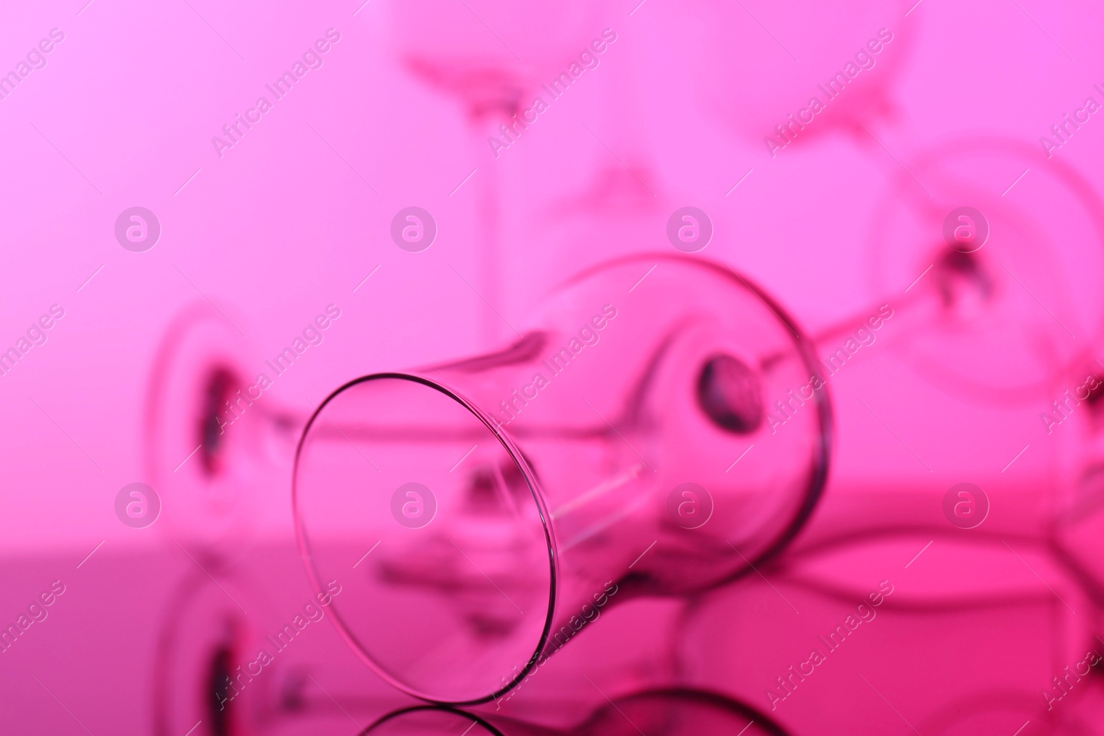 Photo of Empty glasses on table, color tone effect