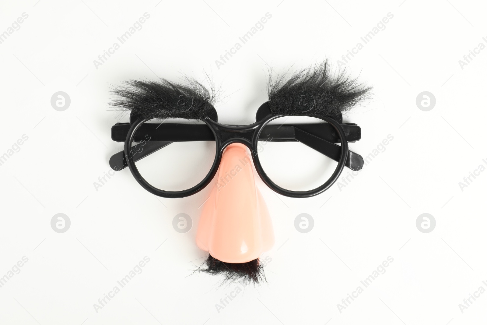 Photo of Funny mask with fake mustache, nose and glasses on white background, top view