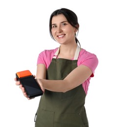 Photo of Happy young woman in apron with payment terminal on white background