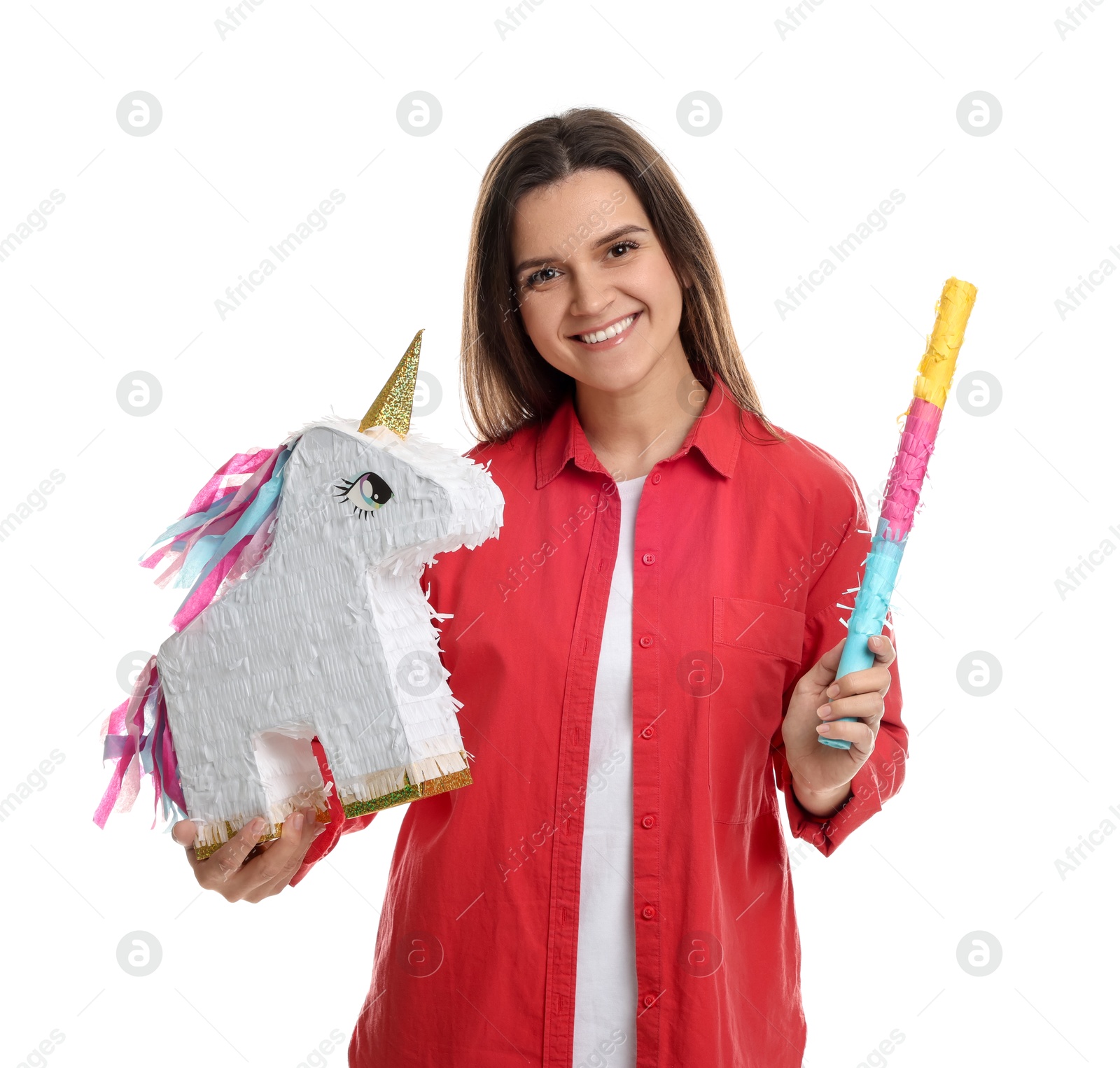 Photo of Happy woman with unicorn shaped pinata and stick on white background