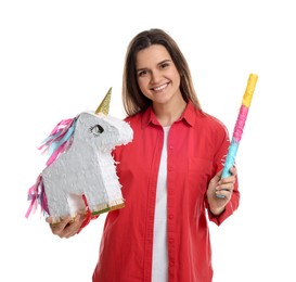 Photo of Happy woman with unicorn shaped pinata and stick on white background