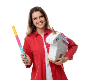 Photo of Happy woman with unicorn shaped pinata and stick on white background