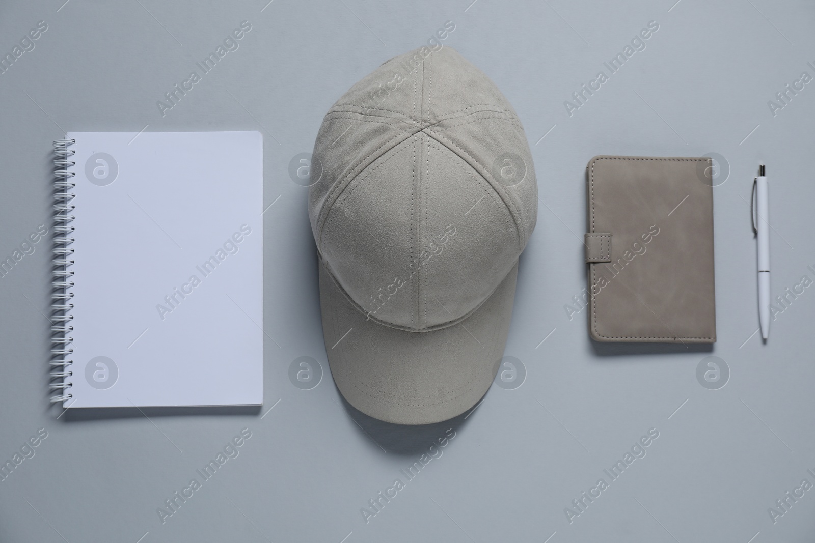 Photo of Different blank items for branding on gray background, flat lay. Mockup for design