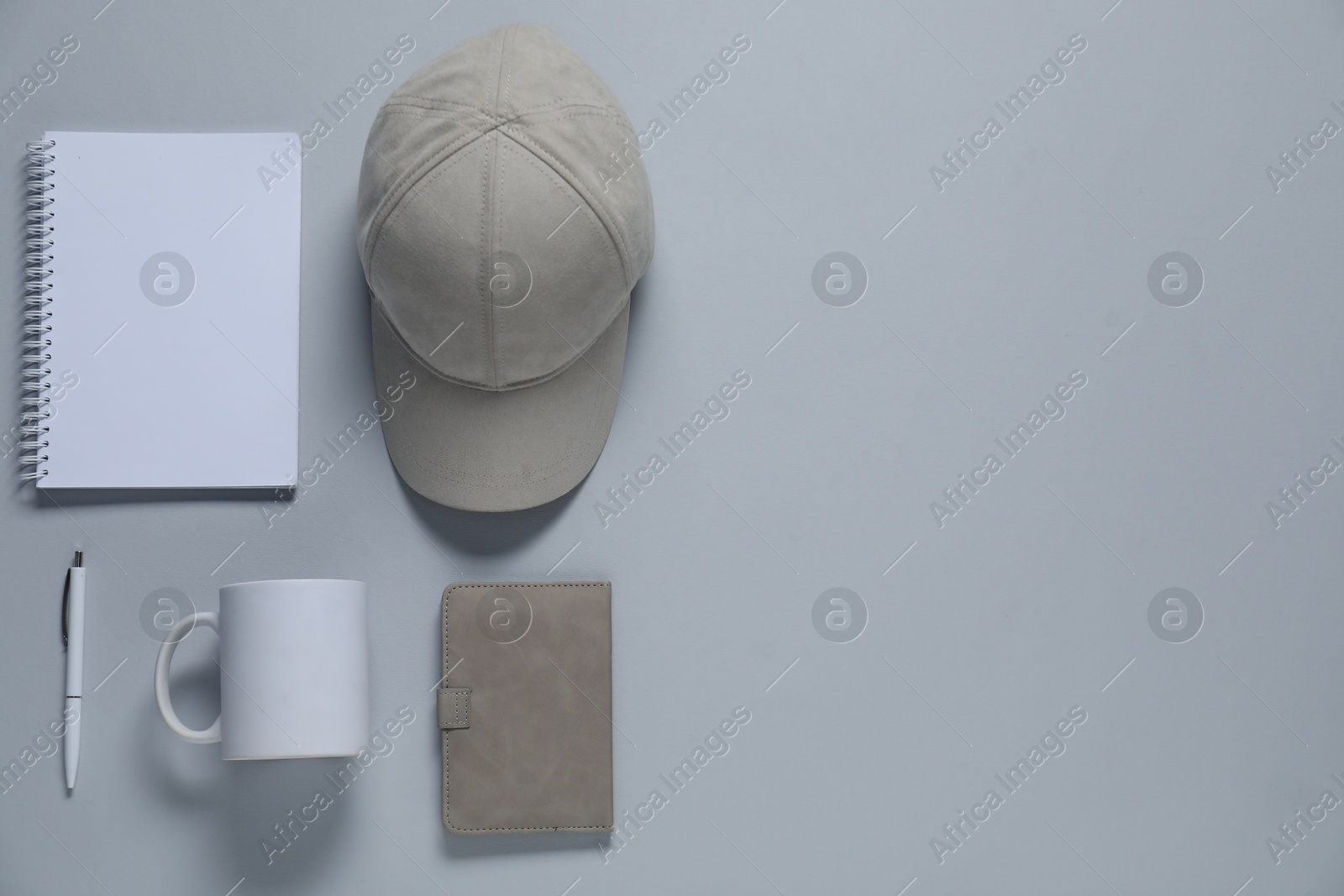 Photo of Different blank items for branding on gray background, flat lay. Mockup for design