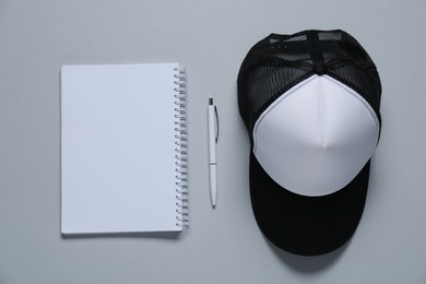 Photo of Different blank items for branding on gray background, flat lay. Mockup for design