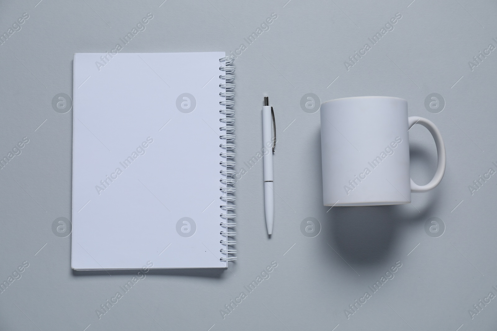 Photo of Different blank items for branding on gray background, flat lay. Mockup for design