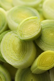 Photo of Chopped fresh leek as background, closeup view