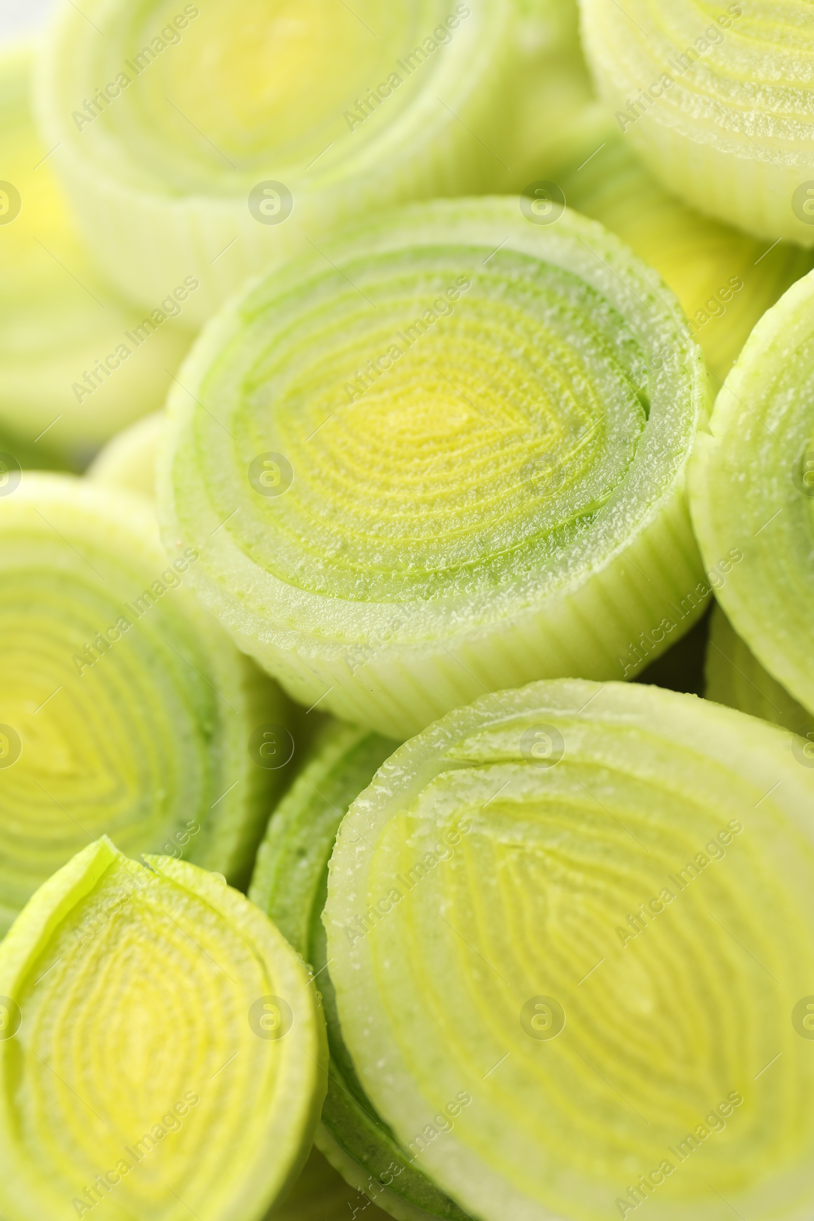 Photo of Chopped fresh leek as background, closeup view