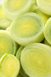 Photo of Chopped fresh leek as background, closeup view