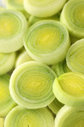 Photo of Chopped fresh leek as background, closeup view