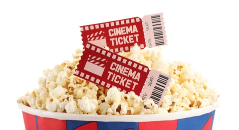 Photo of Tasty popcorn and movie tickets isolated on white