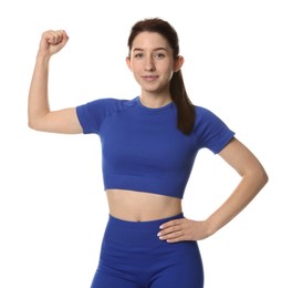 Photo of Portrait of woman in sportswear on white background