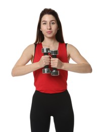 Photo of Woman in sportswear exercising with dumbbells on white background