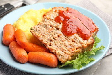 Photo of Delicious baked turkey meatloaf with mashed potato served on table, closeup