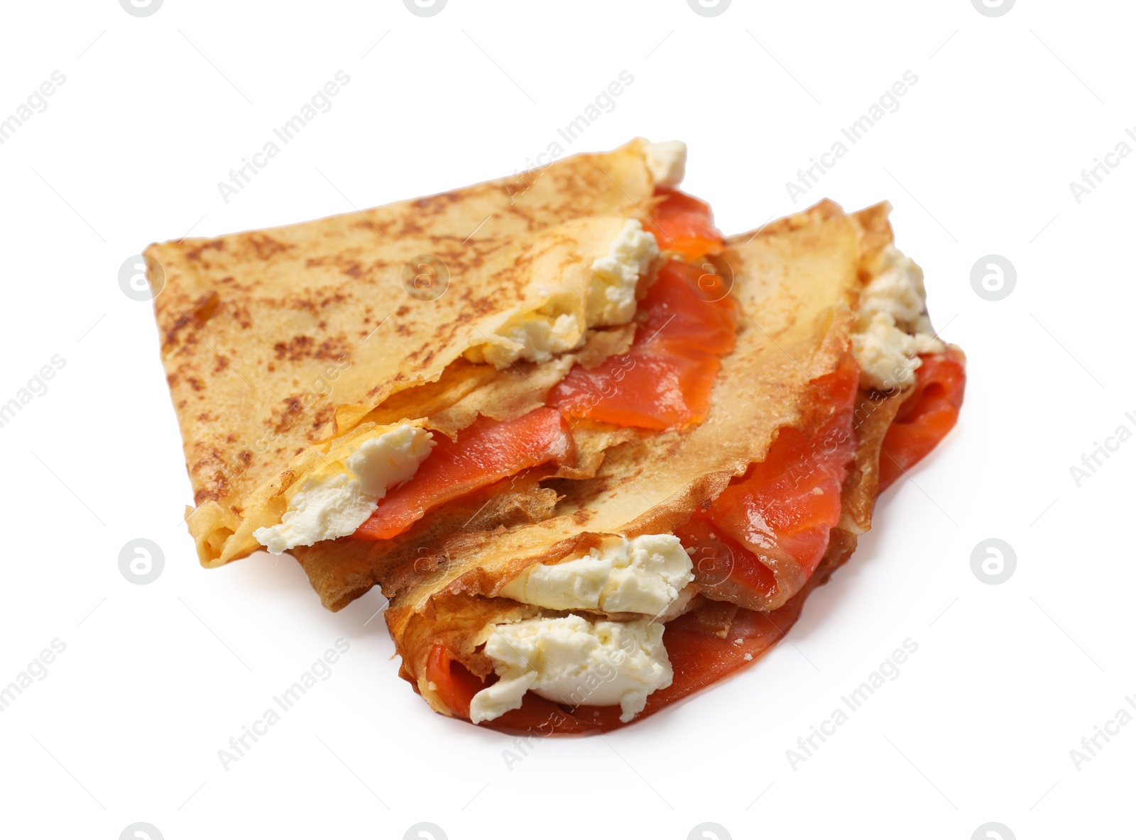 Photo of Delicious crepes with salmon and cream cheese isolated on white