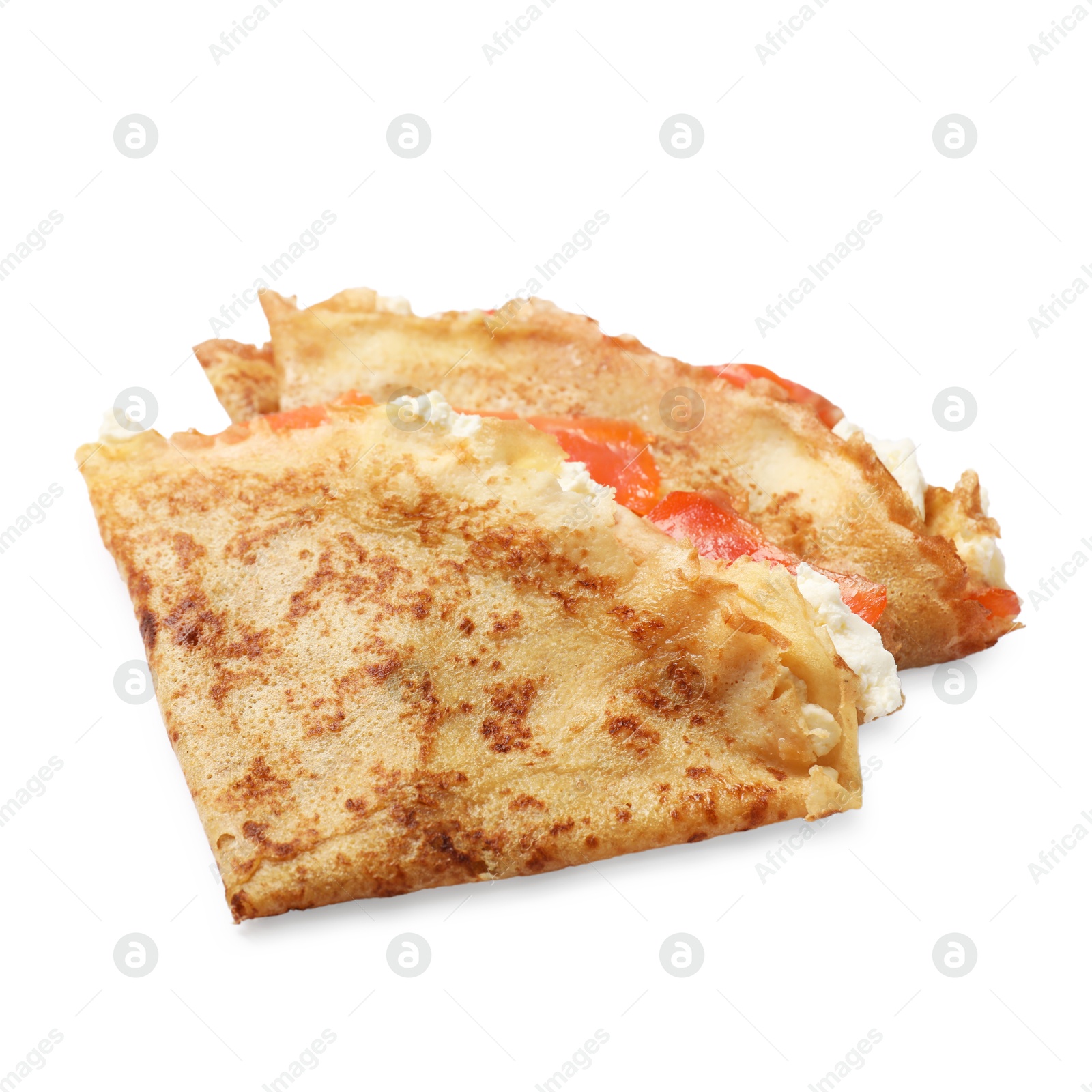 Photo of Delicious crepes with salmon and cream cheese isolated on white