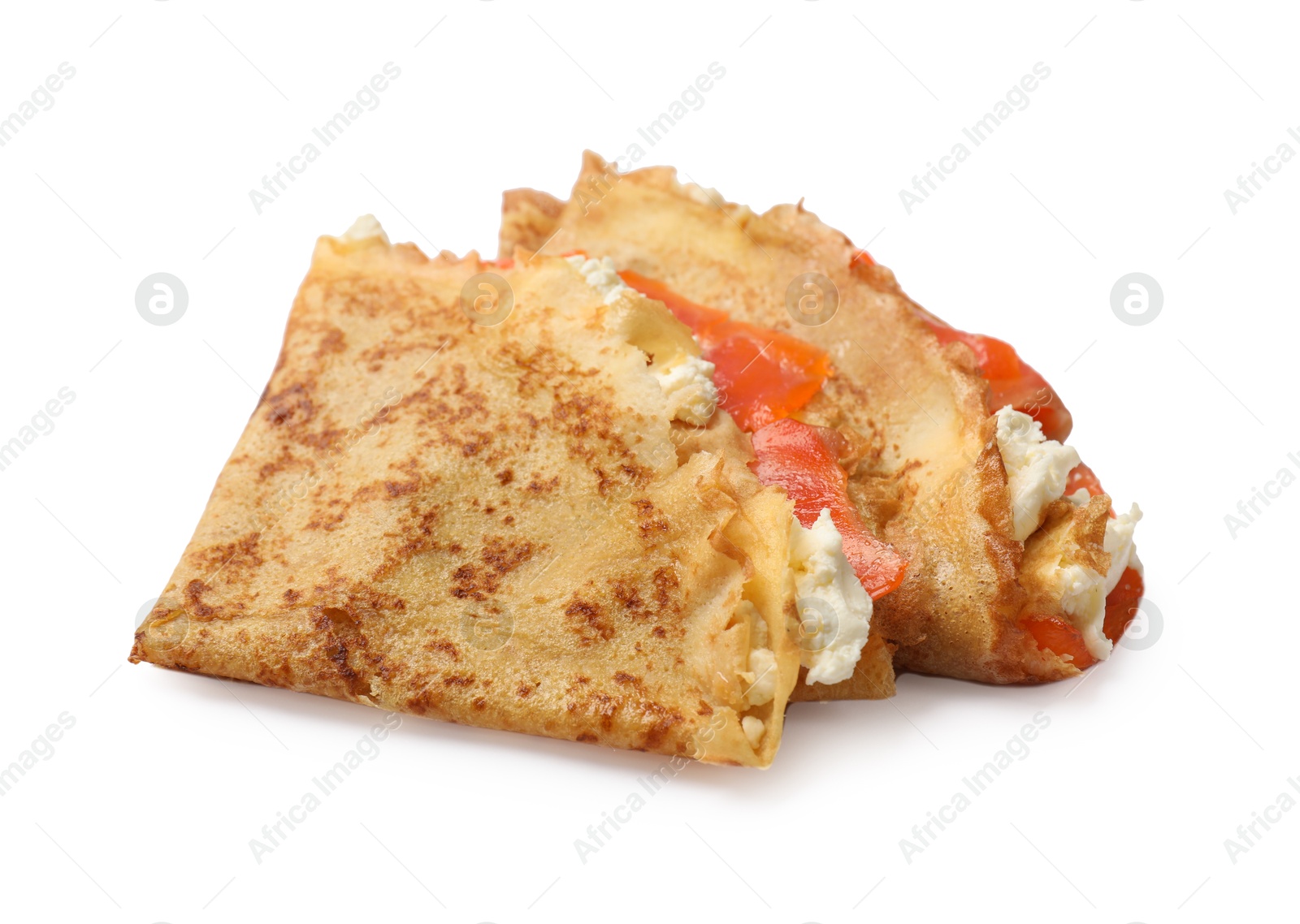 Photo of Delicious crepes with salmon and cream cheese isolated on white