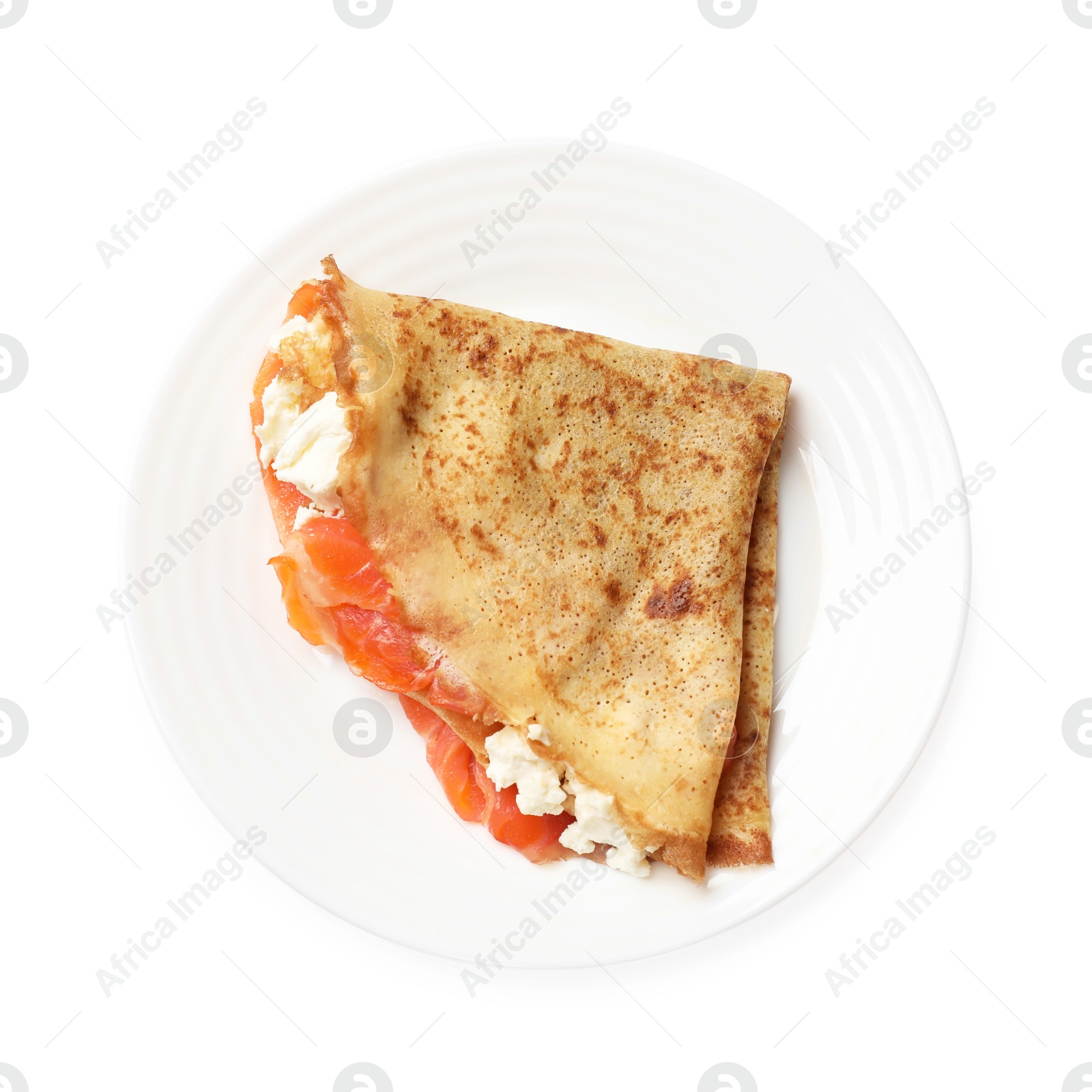 Photo of Delicious crepe with salmon and cream cheese isolated on white, top view