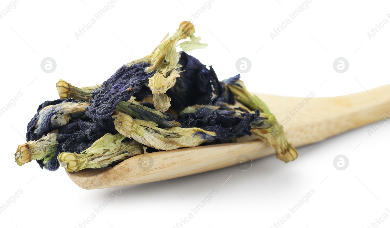 Photo of Butterfly pea flower tea. Dry Clitoria ternatea petals isolated on white