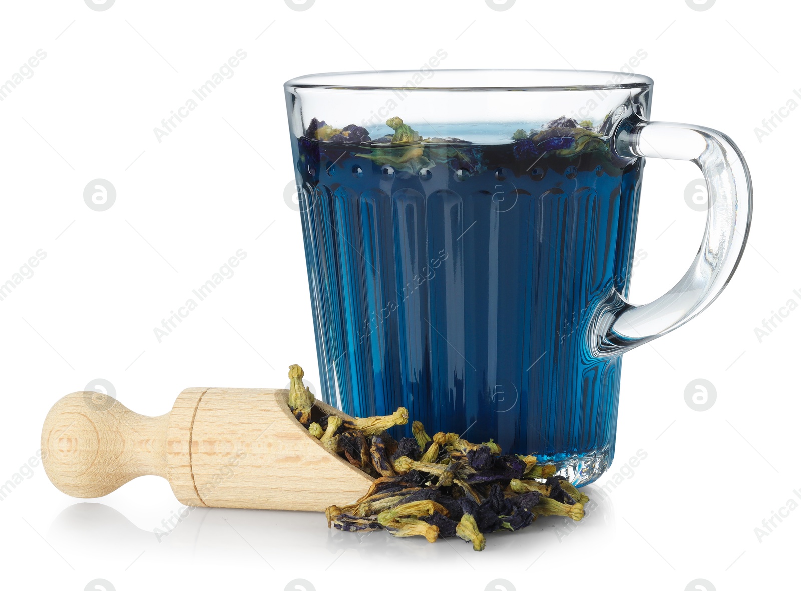 Photo of Fresh butterfly pea flower tea in cup and scoop with dry petals isolated on white