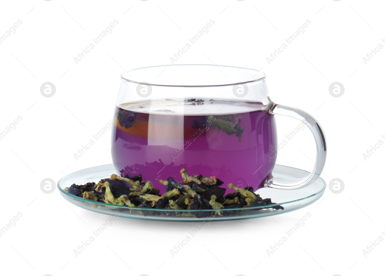 Photo of Delicious butterfly pea flower tea in glass cup and dry petals isolated on white