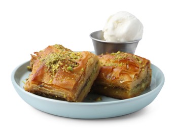 Photo of Delicious baklava with crushed nuts and ice cream isolated on white