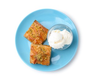 Photo of Tasty baklava with chopped nuts and scoops of ice cream isolated on white, top view