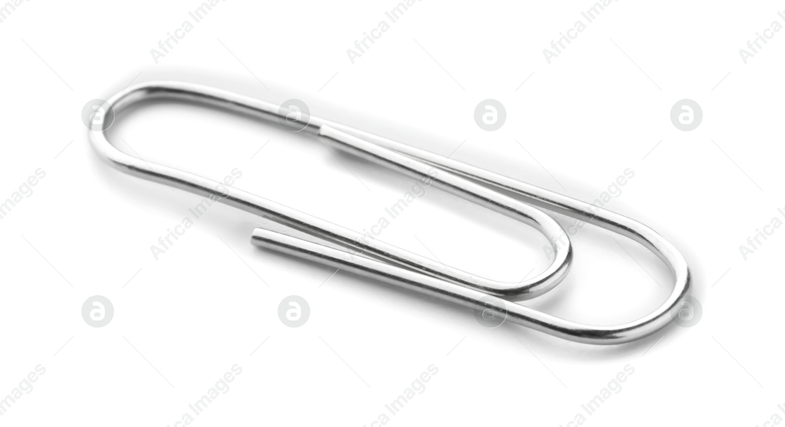 Photo of One metal paper clip isolated on white