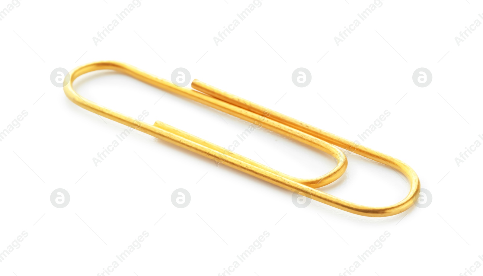 Photo of One bright paper clip isolated on white