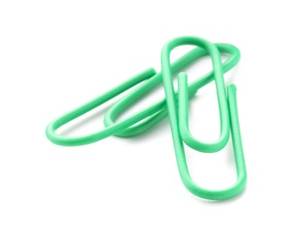 Photo of Two bright paper clips isolated on white