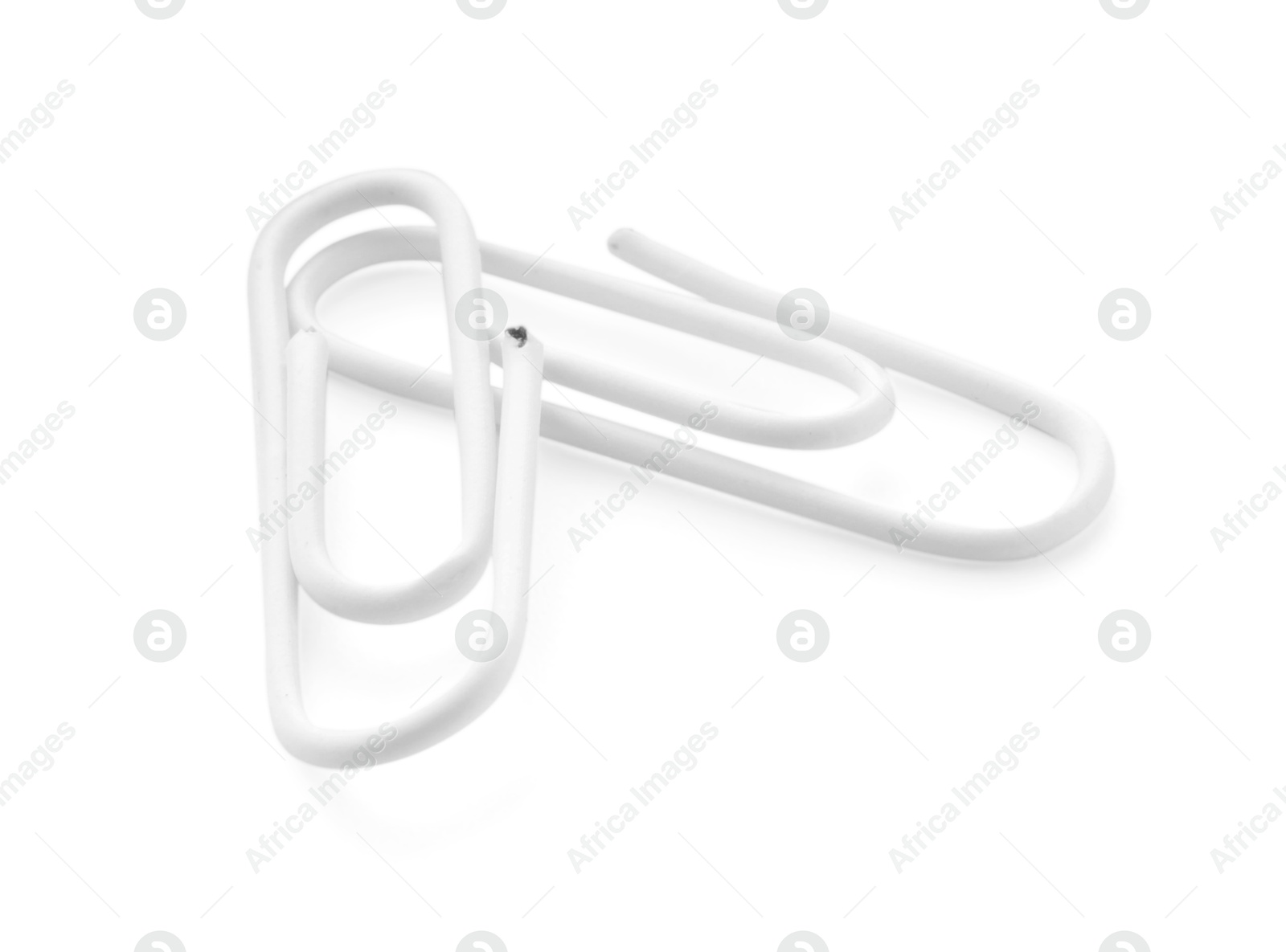 Photo of Two new paper clips isolated on white