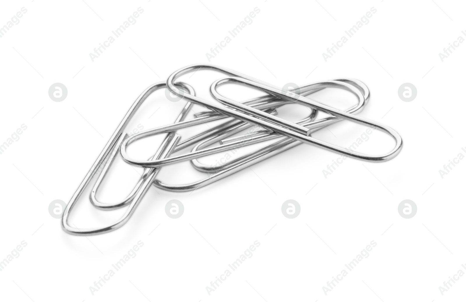 Photo of Many metal paper clips isolated on white