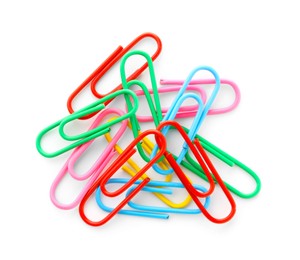 Photo of Many colorful paper clips isolated on white, top view