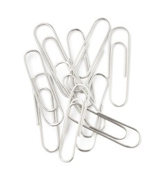 Photo of Many metal paper clips isolated on white, top view