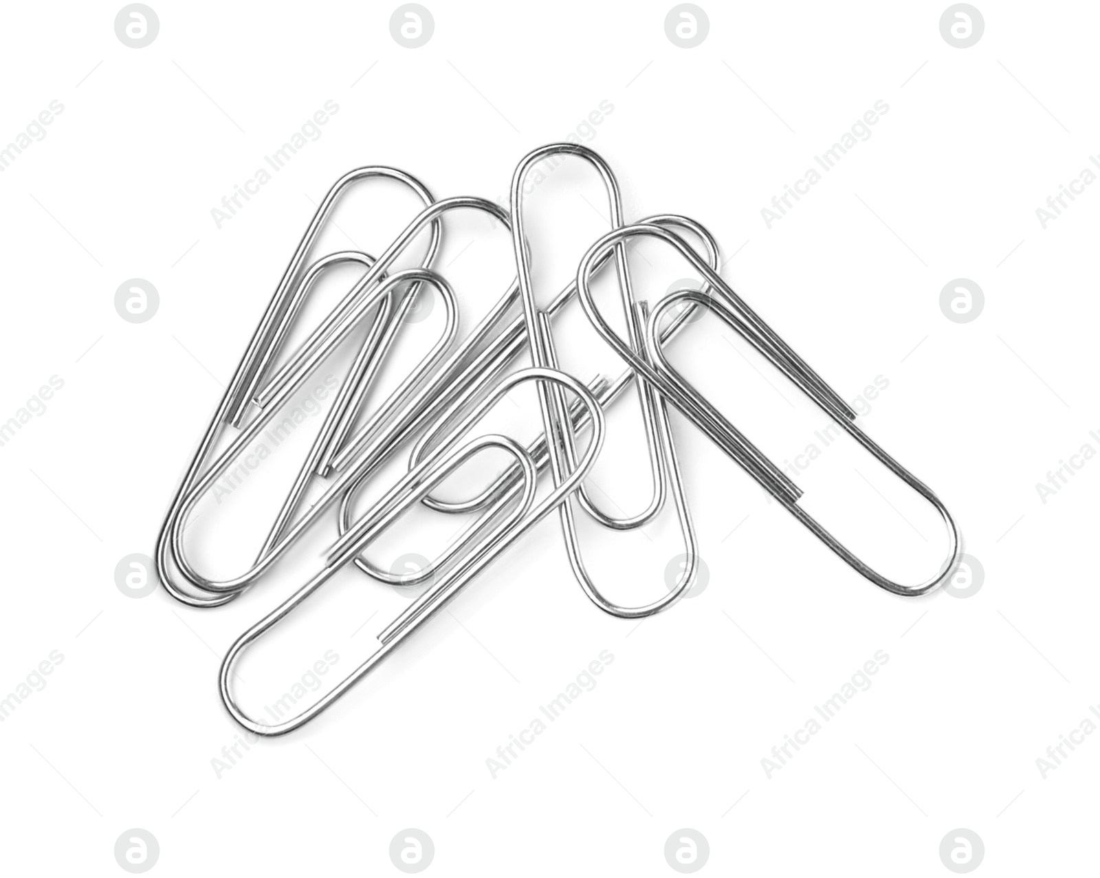 Photo of Many metal paper clips isolated on white, top view