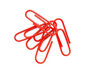 Photo of Red paper clips isolated on white, top view