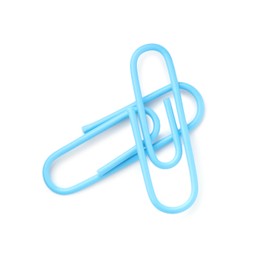 Bright paper clips isolated on white, top view