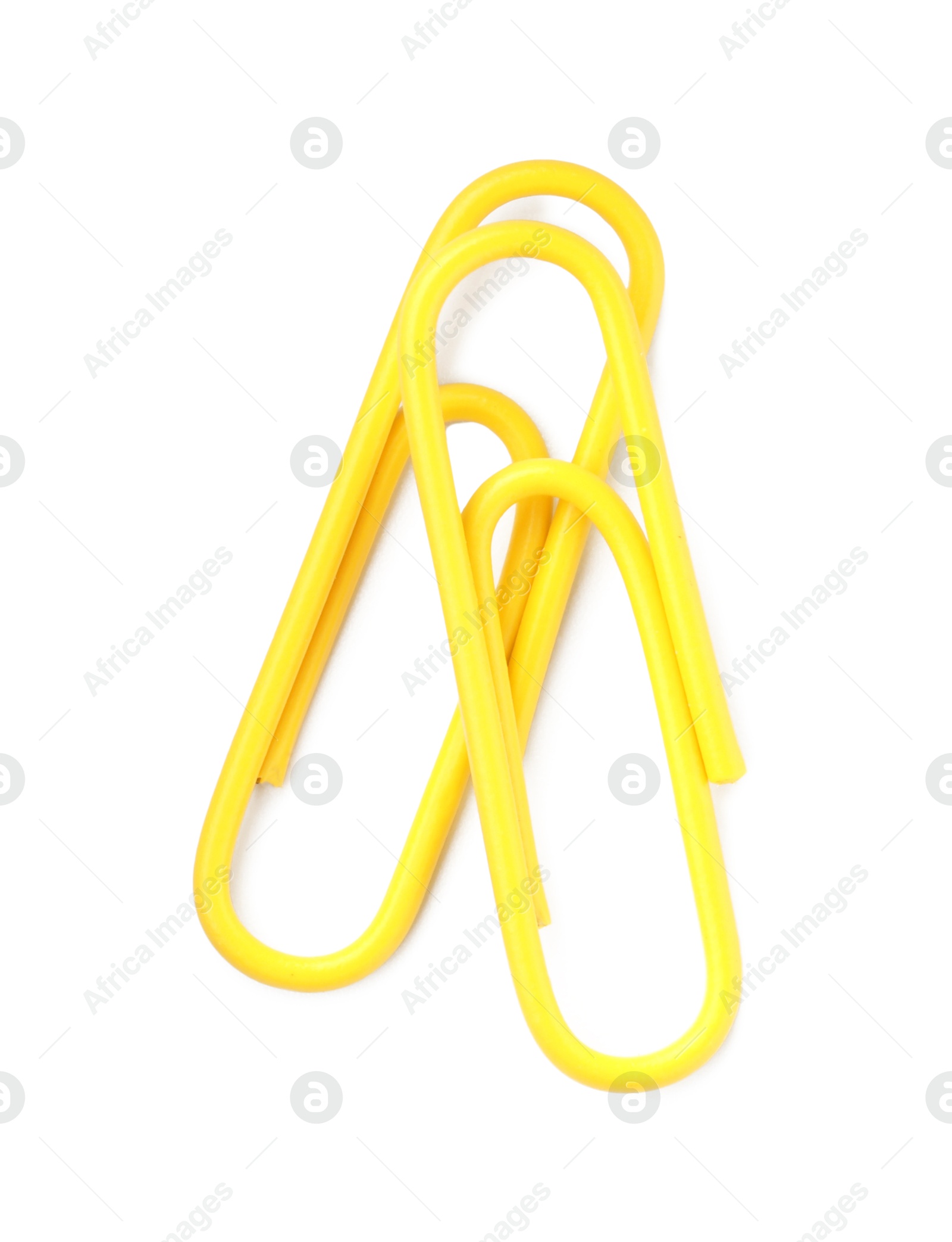 Photo of Bright paper clips isolated on white, top view