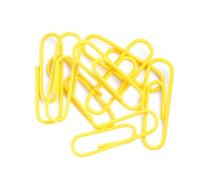 Photo of Bright paper clips isolated on white, top view