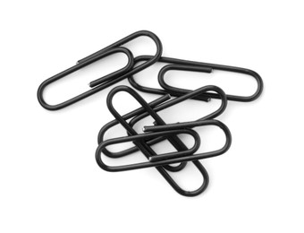 Photo of Black paper clips isolated on white, top view