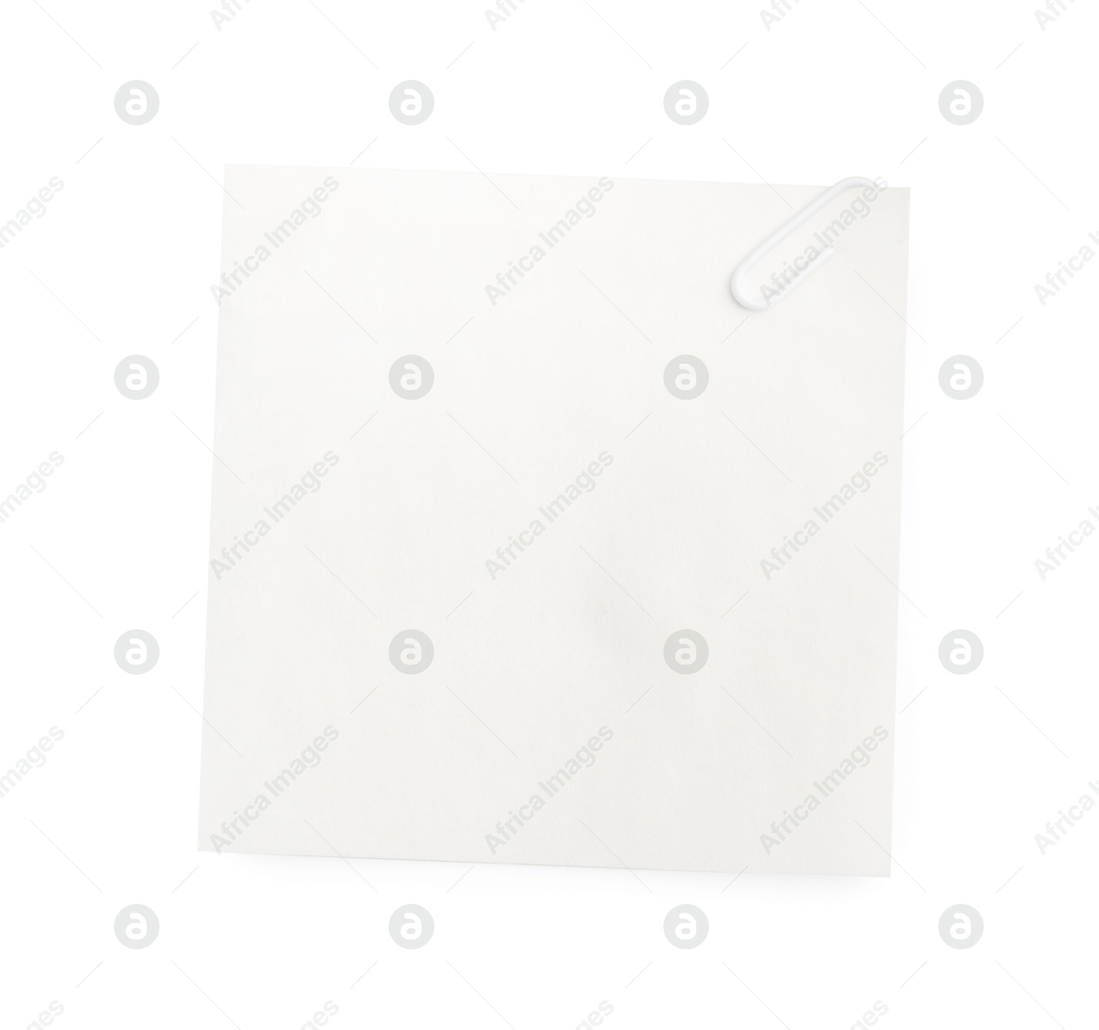 Photo of Blank paper note attached with clip isolated on white, top view