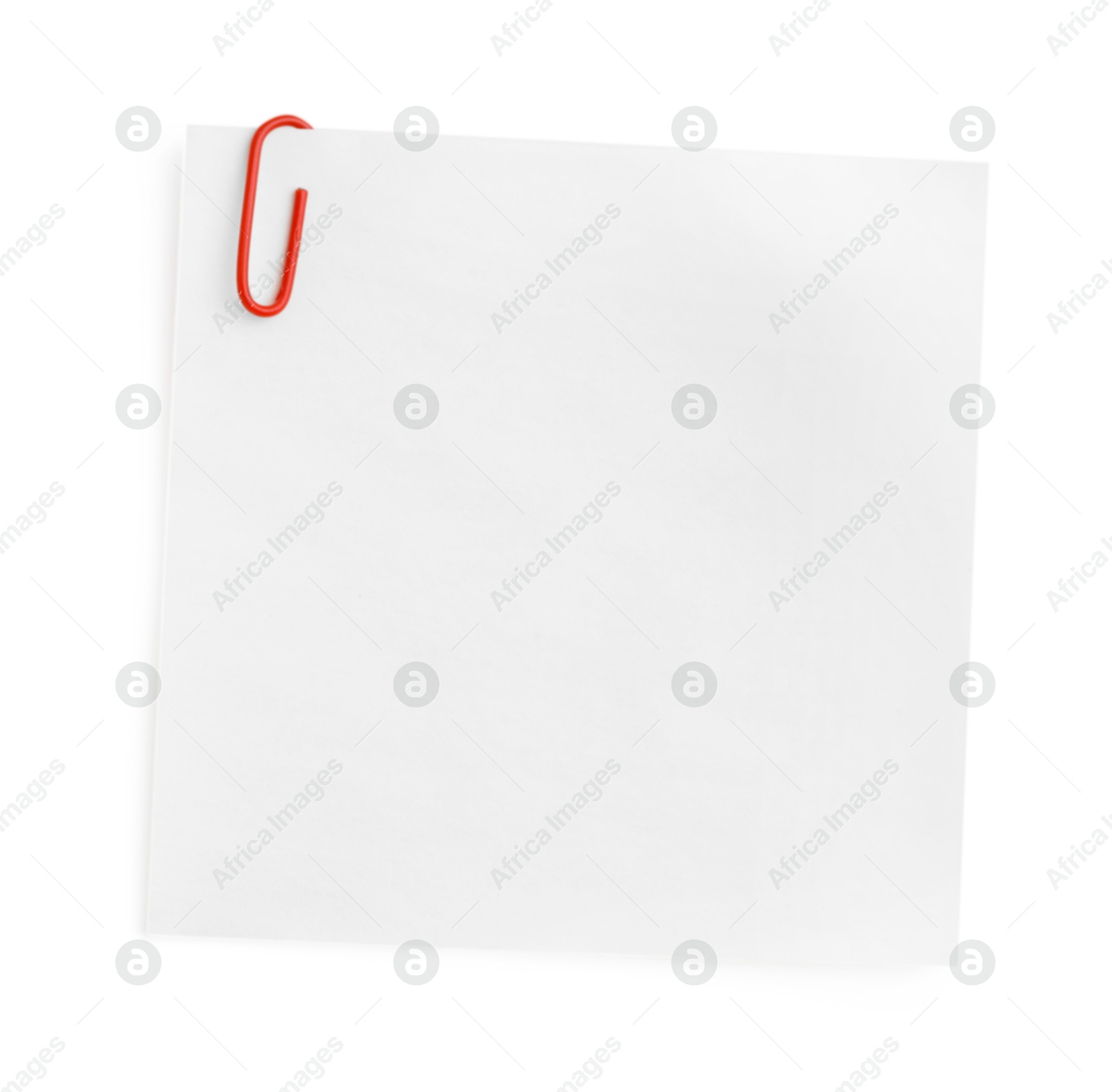 Photo of Blank paper note attached with clip isolated on white, top view