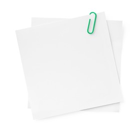 Photo of Blank paper notes attached with clip isolated on white, top view