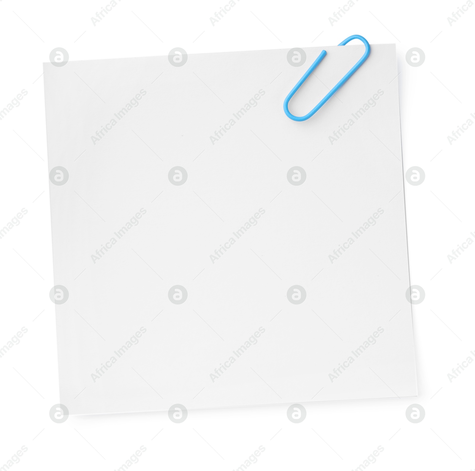 Photo of Blank paper note attached with clip isolated on white, top view