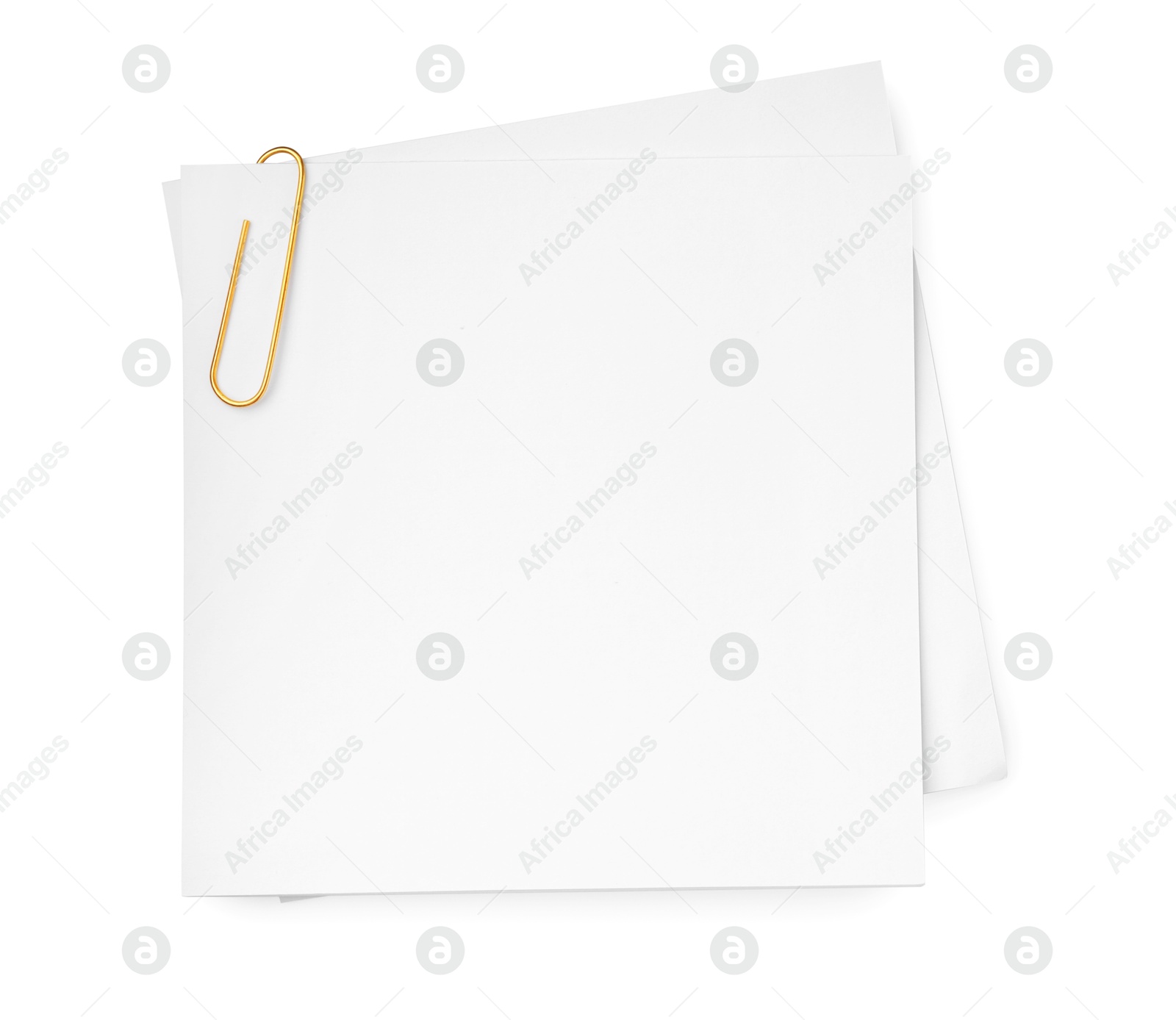 Photo of Blank paper note attached with metal clip isolated on white, top view