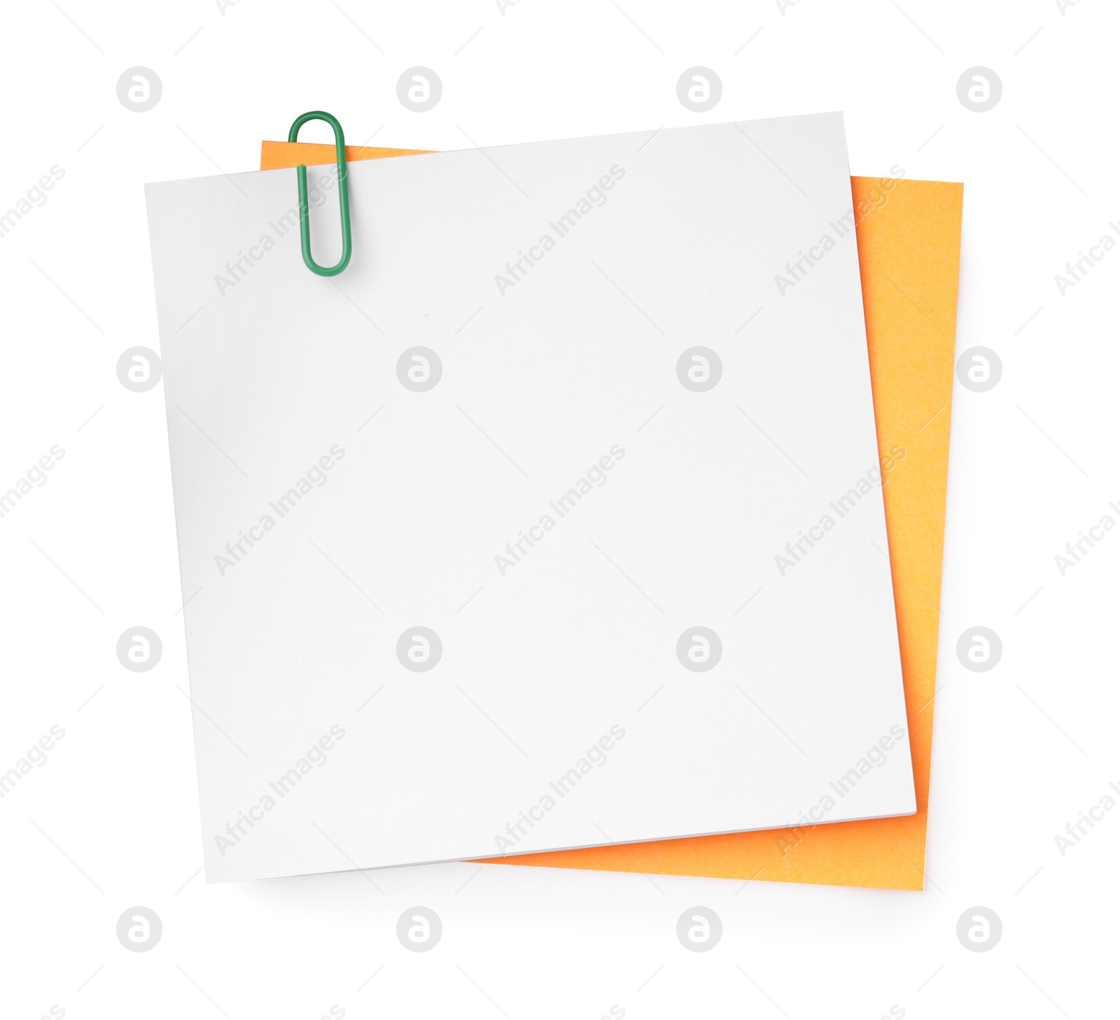 Photo of Blank paper notes attached with clip isolated on white, top view